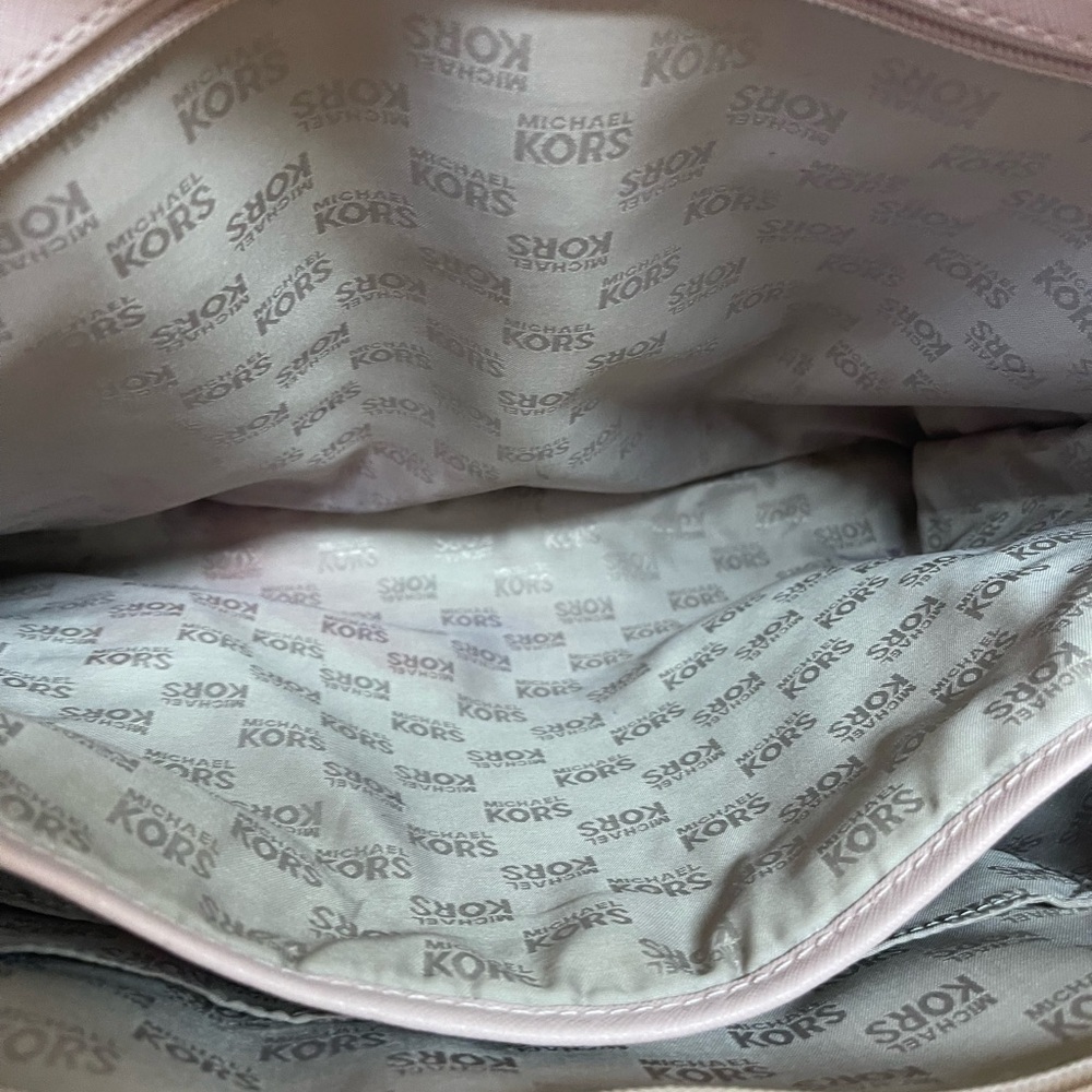 Large tan color Nine West Handbag used like new. Very clean